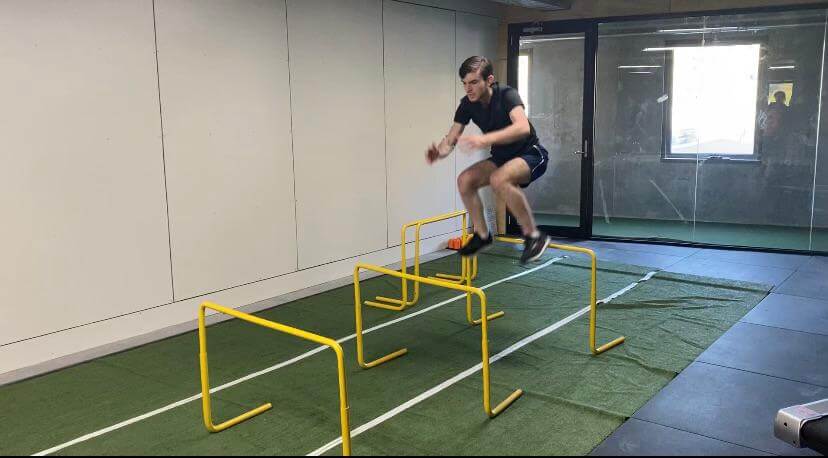 Jumping over fence, strength training by pro strength coaches Melbourne - Run Ready